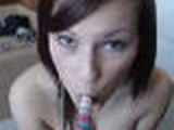 Kate gives her lollipop a sexy blowjob