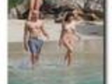 Kelly Brook topless at the beach